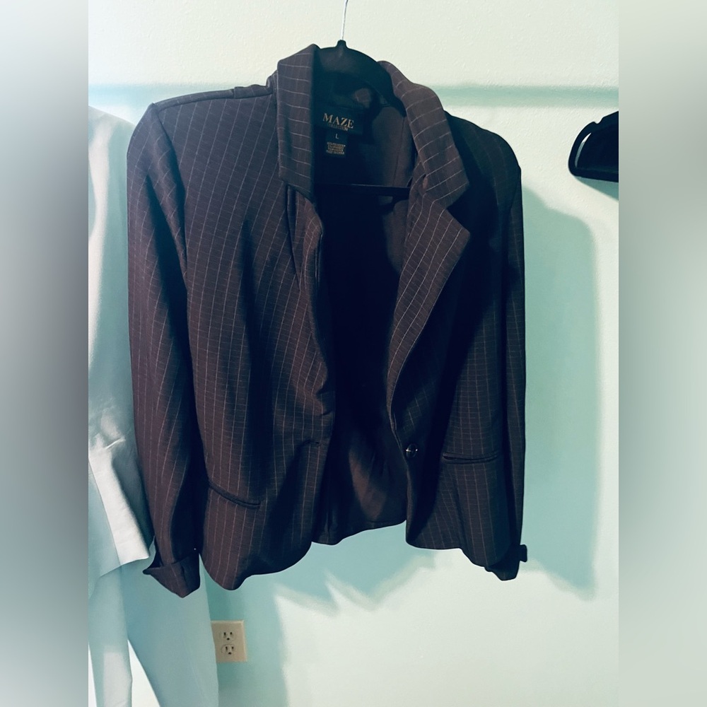 Black plaid blazer size large. Never worn